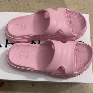 Givenchy slides worn once on a beach.